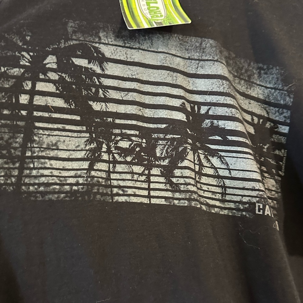 New, never worn Cariloha Shirt size Med.